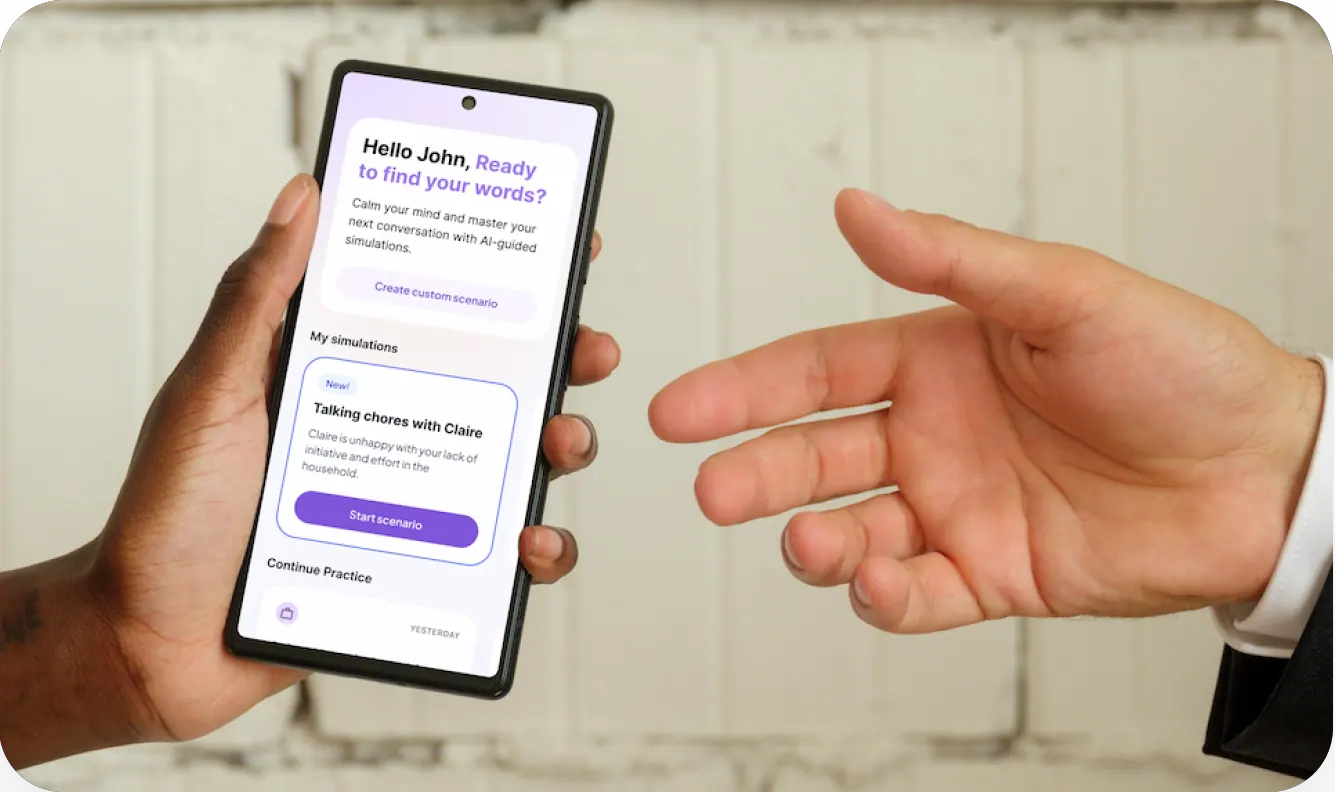 A hand holding a phone showing the Convrsy session-end screen